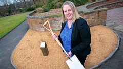 Councillor Amanda Chadderton, Leader of Oldham Council, is pictured at Alexandra Park helping plant one of the first roses