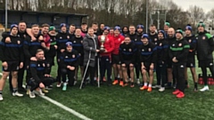 Injured Lewis Sheridan is pictured with his team-mates