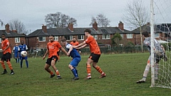 Action from Division Two, as South Manchester came from behind to secure a 5-3 victory over AFC Oldham (orange shirts)
