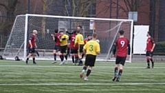 Action from the Chadderton Park (yellow shirts) versus Village Manchester cup clash