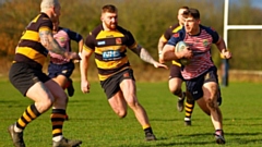 Oldham's Phil Whitham (right) makes a break