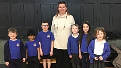 Amy Hathaway MBE, the founder and director of the Forever Angels charity, is pictured with some of the St Matthew's Primary School children