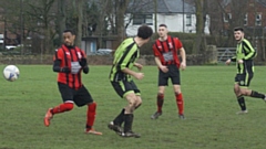 Action from the Division Three clash between Moston Brook thirds and Old Strets Reserves, which Strets won 7-3