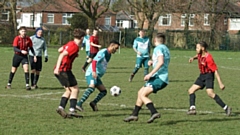 Action from the L&C Division D clash between Poynton Youth Development and AFC Oldham thirds, which Poynton won 4-2
