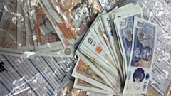 A total of £57,400 in cash was seized and approximately £360,000 worth of street value drugs