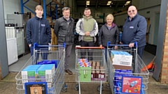 L-R Triton Construction's Ellis Whitehead; Chancerygate's Mike Walker; Oldham Foodbank's Tom Lewis-Hood and Lorraine Fraser; and Triton Construction's Phil Dyer