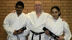 Sensei Fred Jones is pictured with students Hamed and Anosha
