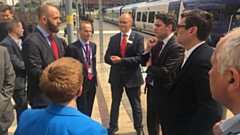 Rail minister Huw Merriman visits Manchester Victoria station