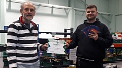 Saddleworth Rotary Club President Ian Brett and Oldham Foodbank Manager Tom Lewis-Hood accepting £500 worth of Aldi vouchers on behalf of the Foodbank just a fortnight ago