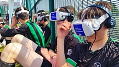 Young people using the VR headsets