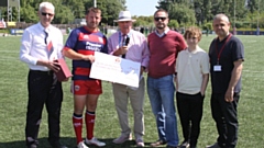 Pictured left to right: Mike Kivlin (chairman, Rugby Oldham); Martyn Ridyard (first winner of the Brian Walker Awards Scheme); John Chadwick (Oldham RLFC vice-president); Brian’s son Adrian; Brian’s grandson Oscar; Simon Winnard (club director and a man who, with Brian, helped to establish Rugby Oldham). Image courtesy of ORLFC