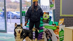 A Blue Cross donation point in a typical Pets at Home store