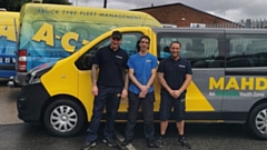 Pictured are technicians from A C Tyres alongside the Mahdlo minibus