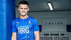 Dan Ward shows off the new Latics shirt