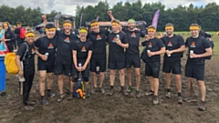 The WeDo team who took part in Tough Mudder 2023, with Harry Dwan of Mustard Tree, third left