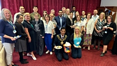 Mayor of Oldham Councillor Zahid Chauhan OBE, local councillors, volunteers and NHS staff at the NHS 75 Big Tea in Oldham