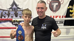 Twelve-year-old Jac Yates is pictured with Isaan Gym head coach Ste Donnelly