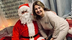 Owner/Nursery Director Jane is pictured with Santa