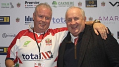 Pat Mulvihill is pictured with Oldham chairman Bill Quinn. Image courtesy of ORLFC