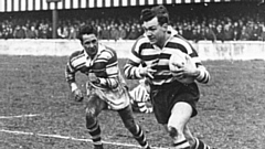 John Etty pictured in full flight. Image courtesy of Oldham Rugby League Heritage Trust and ORLFC