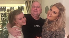 Happier times: Mark Tierney with his daughters, Lily and Carly
