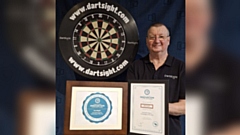Stuart Needham with the Innovation Award Certificates