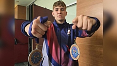 Jacob Cartwright pictured with his medals