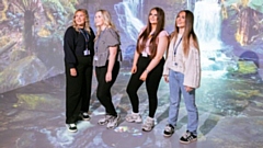 The new facility surrounds learners with moving images, sounds and interactive visuals across every wall and the floor, creating a 360° digital world