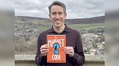 Richard Hooton with his debut novel The Margaret Code