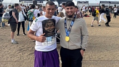 Pictured (left) is Mofozul Miah after completing the London Marathon