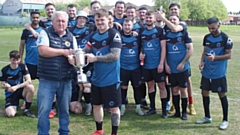 Waterhead receive the Division A champions trophy from L and C chairman Mike Yates