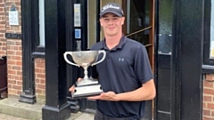 Crompton and Royton's Corey Pearson shows off his trophy