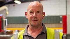 Jason Hilton with his 25-year service awards
