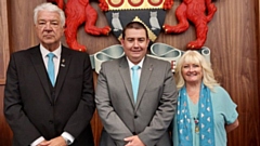 Reform UK's Royton North councillor Lewis Quigg is flanked by Independent councillors Mark Wilkinson and Sandra Hall, both of whom represent Failsworth West