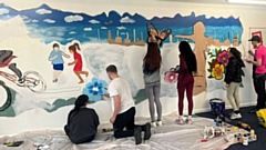 Artist Evan worked closely with the students on both the design and the painting