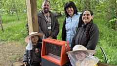 L-R Maryam Ahmad aged 5, Carl Turner - Neighbourhood Manager at FCHO, Catherine Charnock - Beekeeper at Local Food First CIC, Musa Ahmad aged 3, Lina Valencia - Founder of Local Food First CIC