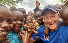 Steve Hill and students in Uganda 